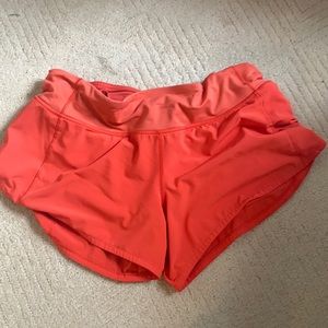 Orange lulu shorts size 6
